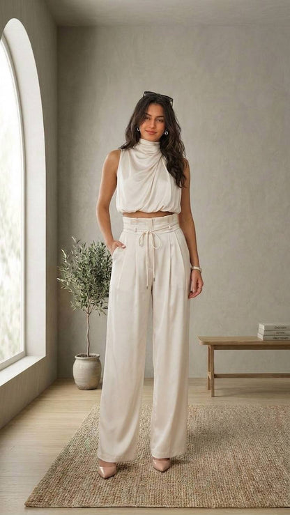 Conjunto elegante con top sin mangas y pantalón amplio